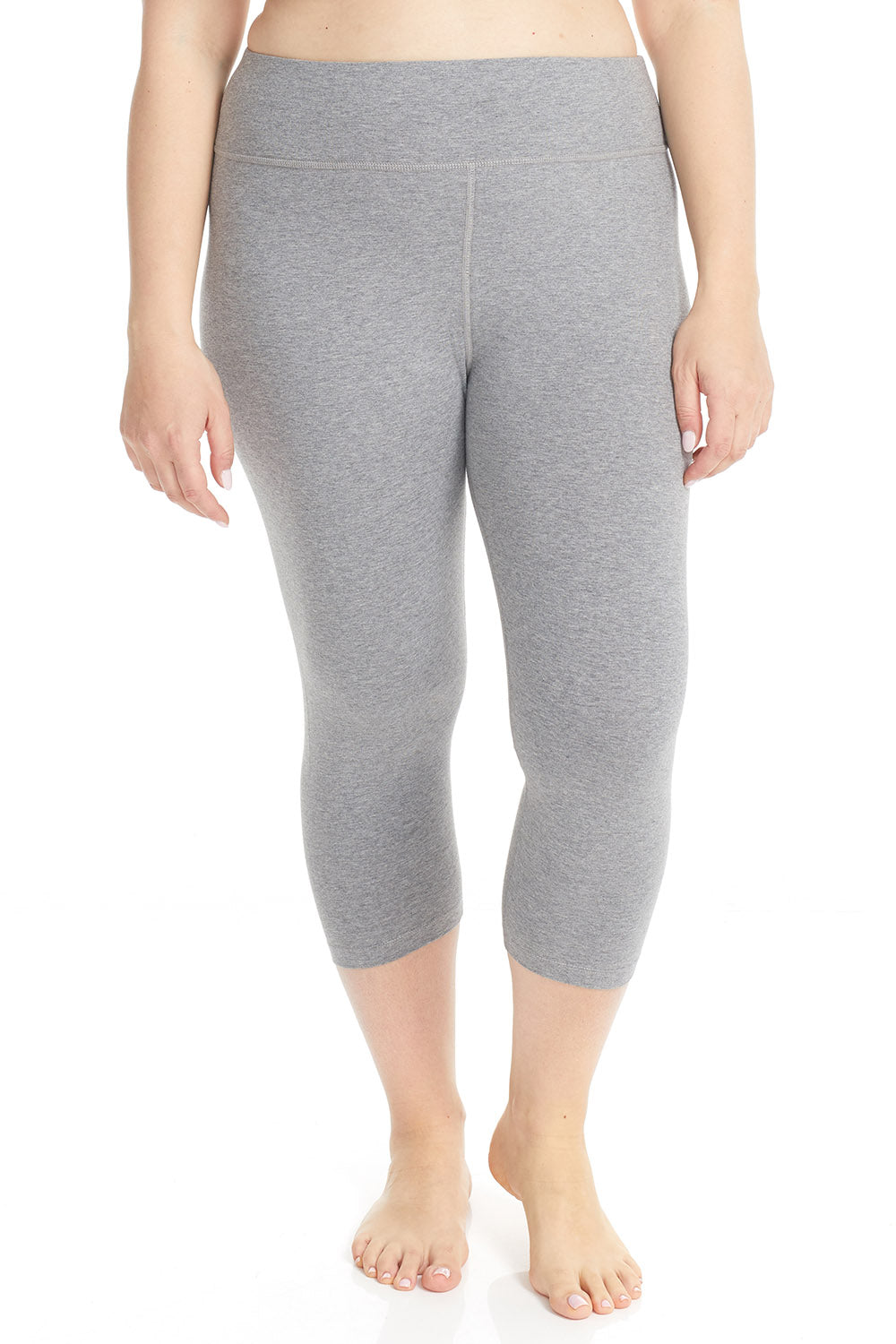 woman wearing grey capri leggings