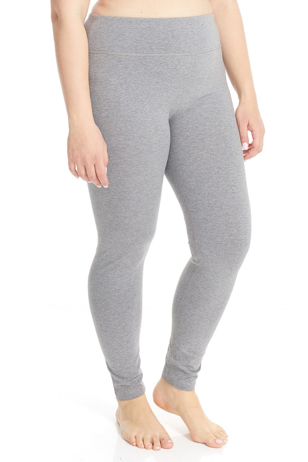 woman wearing light grey ankle length leggings