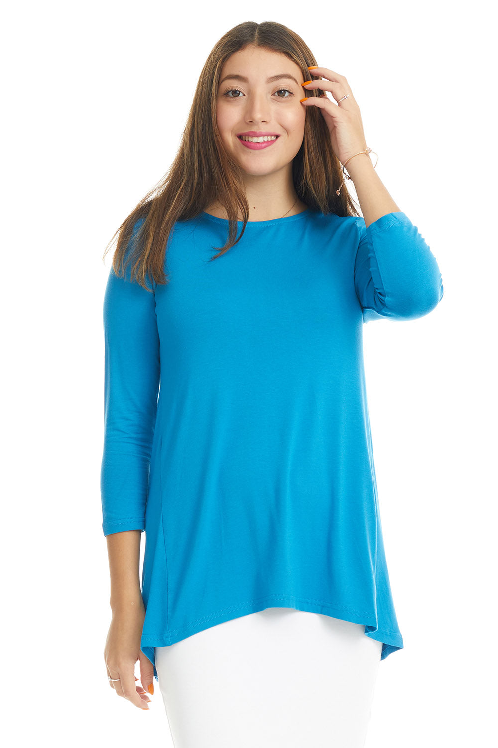 woman wearing a blue basic tznius flattering loose tunic plus size shirt