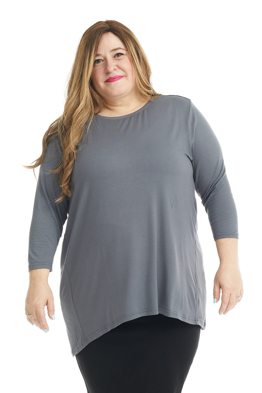 plus size woman wearing a charcoal grey gray crew neck high-low loose tunic top