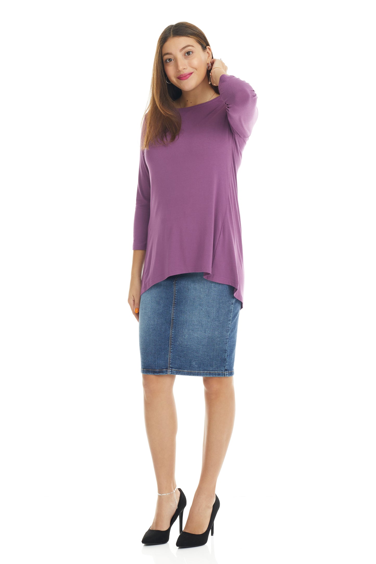 woman wearing a purple crew neck high-low loose tunic top