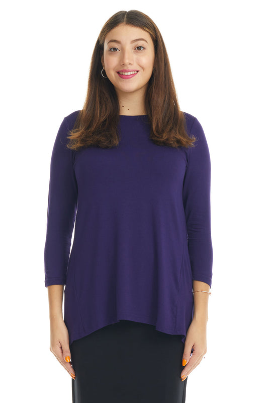 woman wearing a purple soft crew neck modest tzniut top