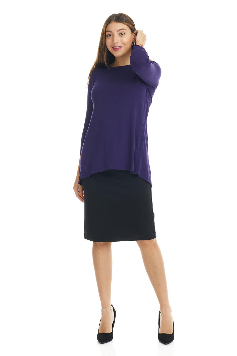 woman wearing a purple crew neck high-low loose tunic top