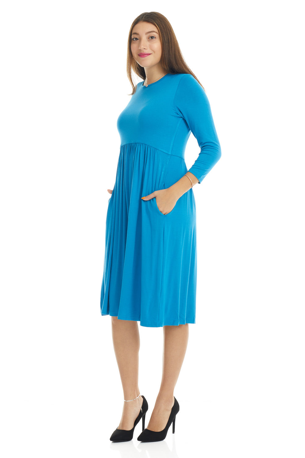 woman wearing a modest blue 3/4 sleeve knee length dress