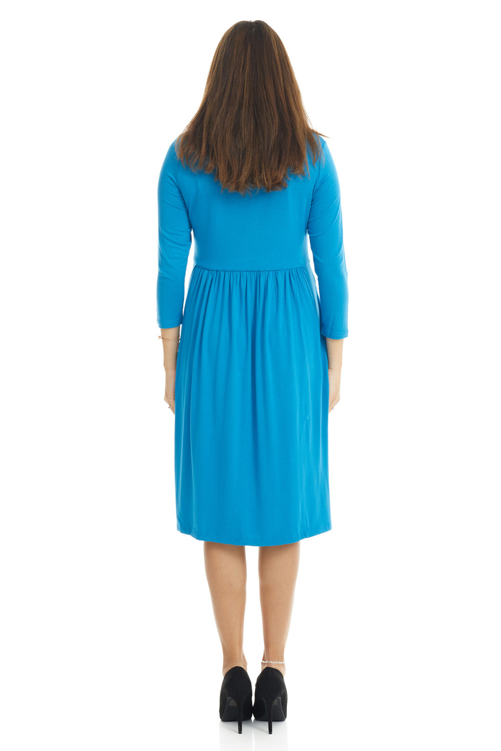 woman wearing a modest blue 3/4 sleeve knee length dress