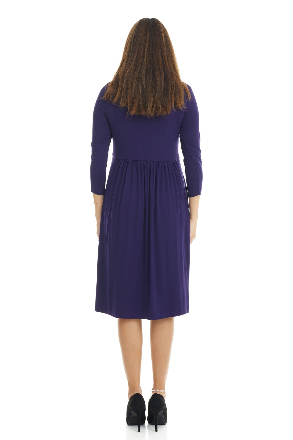 woman wearing a modest navy blue 3/4 sleeve knee length dress