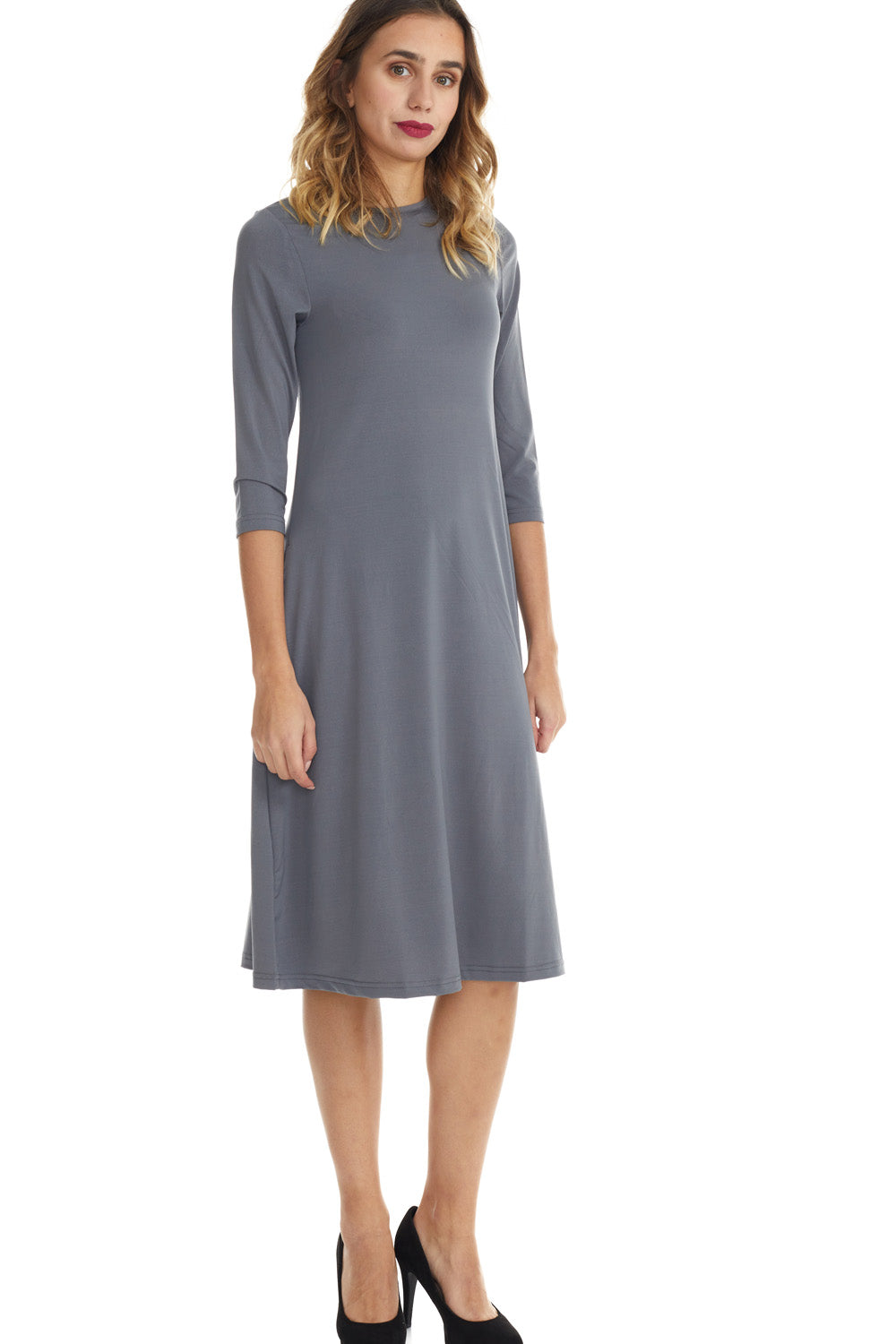 woman wearing grey flary 3/4 sleeve knee length modest dress