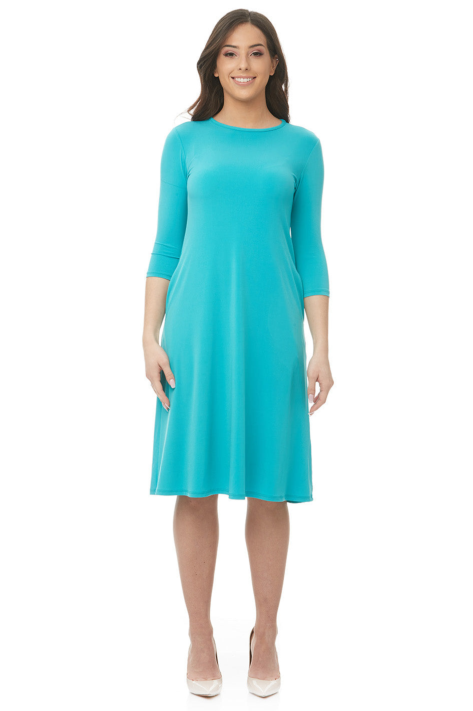 woman wearing teal flary 3/4 sleeve knee length modest dress