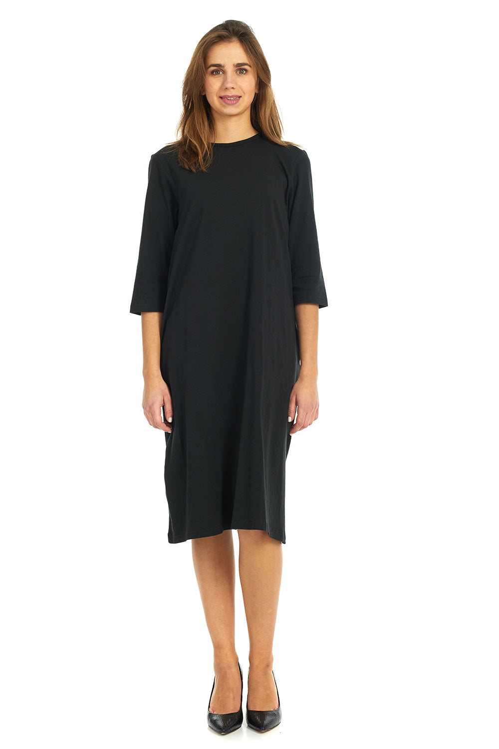 woman wearing a modest knee length, black 3/4 sleeve cotton t-shirt dress