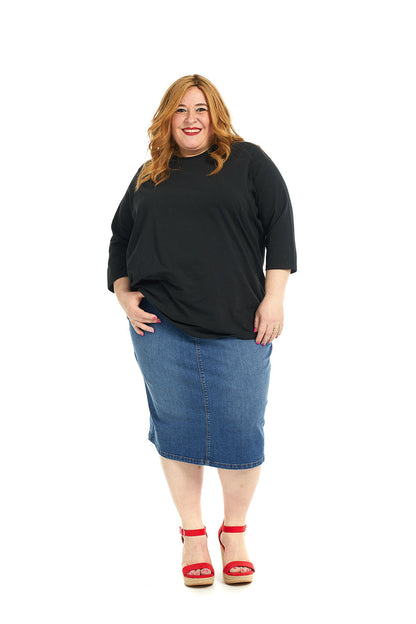 plus size woman woman wearing classic blue knee length denim jean skirt