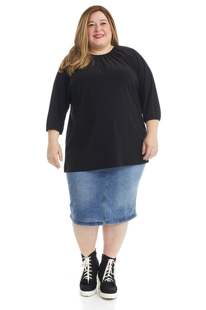 plus size woman woman wearing vintage blue knee length denim jean skirt